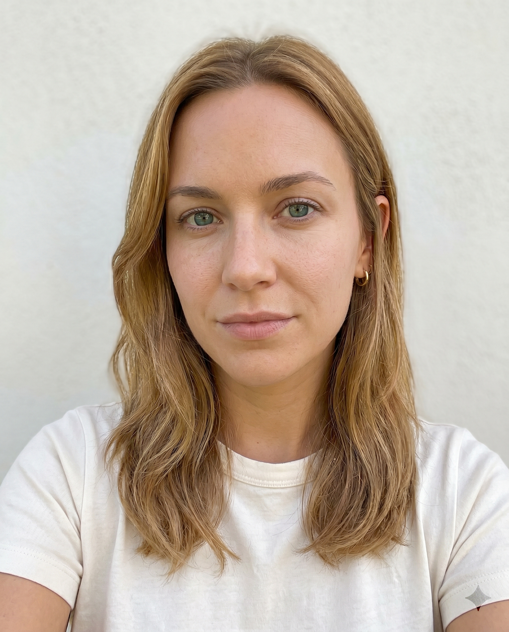 Bare-faced selfie showing natural skin tone after removing all makeup